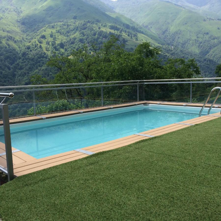 Chalet Con Piscina Garzeno Exterior photo